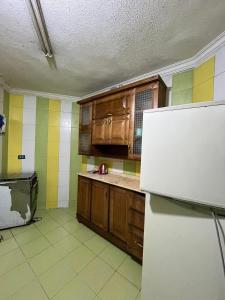 Kuchyň nebo kuchyňský kout v ubytování سونا موتل + 8 fotografií