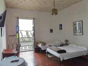 Katil atau katil-katil dalam bilik di Hostal Frailejon Sonsón