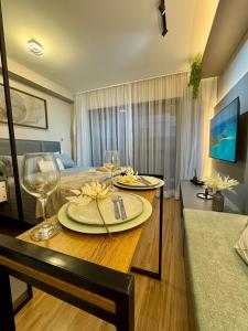 TV a/nebo společenská místnost v ubytování Aconchego no centro de São Paulo