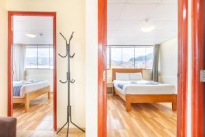 Letto o letti in una camera di Hotel Cusco Guest Home
