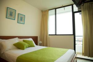 Katil atau katil-katil dalam bilik di Hotel RC Tonsupa