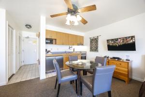a kitchen and dining room with a table and chairs at 145 Bldg C condo in Truckee