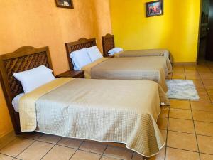 Postel nebo postele na pokoji v ubytování Casa Los Perales