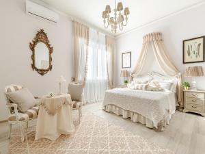 Postel nebo postele na pokoji v ubytování Villa in Lucca near Porta San Pietro