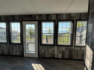 En balkong eller terrasse på Maison vue Fleuve 4 chambres deux pas du traversier !