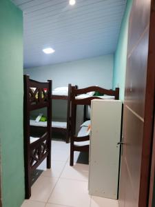 Postel nebo postele na pokoji v ubytování Hostel Ladeira dos 4 Cantos + 37 fotografií