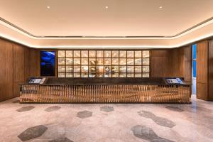 Istumisnurk majutusasutuses Tianjin Station Crystal Orange Hotel