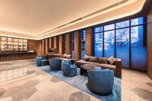Istumisnurk majutusasutuses Tianjin Station Crystal Orange Hotel