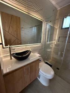Koupelna v ubytování Cabaña moderna en Restrepo Meta
