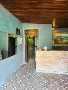 TV a/nebo společenská místnost v ubytování Dicky Guest House Batu Bolong