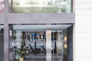 The fitness centre and/or fitness facilities at Apartamento Via Augusta 153