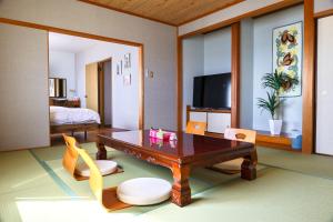 TV a/nebo společenská místnost v ubytování Hotel NALU　ホテルナル