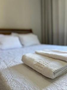 Katil atau katil-katil dalam bilik di Apt Completo Bairro Lourdes