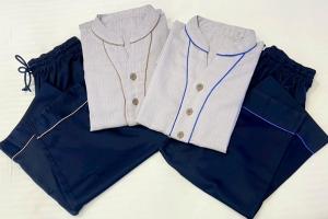 a white jacket and black shorts on a table at Hotel Keihan Universal Tower in Osaka