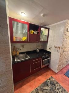 a kitchen with a sink and a counter top at porto marina resort challet in El Alamein