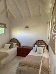 Ένα ή περισσότερα κρεβάτια σε δωμάτιο στο La Florita Chapadmalal