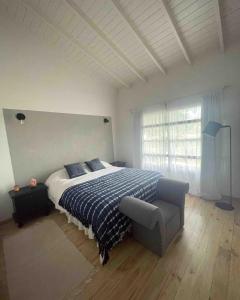 Ένα ή περισσότερα κρεβάτια σε δωμάτιο στο La Florita Chapadmalal +13 φωτογραφίες