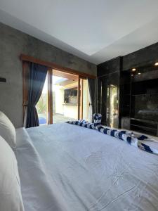 Ένα ή περισσότερα κρεβάτια σε δωμάτιο στο Dream Cozy Stylish 1Bedroom Private Pool +20 φωτογραφίες