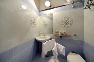 Ванная комната в Azzurromare Residence