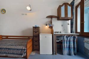 Кухня или мини-кухня в Azzurromare Residence
