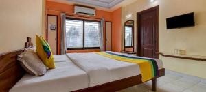 Postel nebo postele na pokoji v ubytování Hotel Kala laxmi lodging