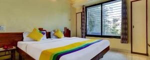 Postel nebo postele na pokoji v ubytování Hotel Kala laxmi lodging