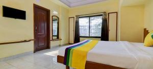 Postel nebo postele na pokoji v ubytování Hotel Kala laxmi lodging