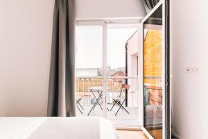 Giường trong phòng chung tại JAMES AT12 - stunning luxury apartment downtown Antwerp