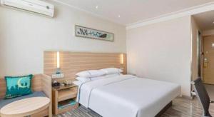 City Comfort Inn Xiangyang Railway Station客房内的一张或多张床位