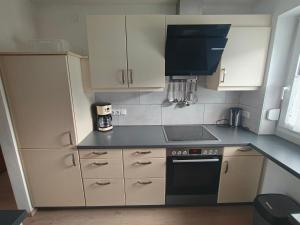 Kuchyň nebo kuchyňský kout v ubytování Haus Birgit + 19 fotografií