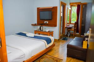 Postel nebo postele na pokoji v ubytování Hotel Gunja