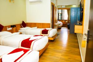 Postel nebo postele na pokoji v ubytování Hotel Gunja