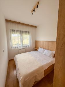 Postel nebo postele na pokoji v ubytování Apartment Vila Jela