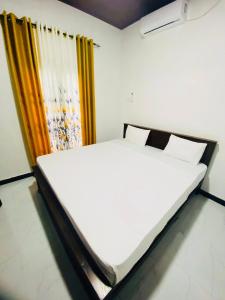 Postel nebo postele na pokoji v ubytování Jungle View Resort