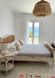 Ένα ή περισσότερα κρεβάτια σε δωμάτιο στο Villa Renata Fiskardo +52 φωτογραφίες