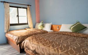 Postel nebo postele na pokoji v ubytování Moonlight