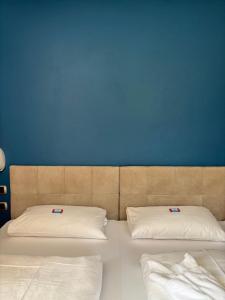Postel nebo postele na pokoji v ubytování Hotel Savoia