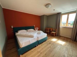 Postel nebo postele na pokoji v ubytování Hotel Savoia
