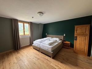 Postel nebo postele na pokoji v ubytování Hotel Savoia