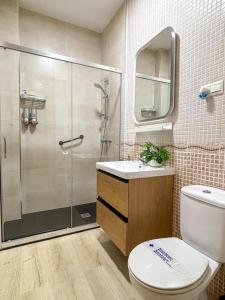 Kúpeľňa v ubytovaní Plz de la Merced Apartamentos Solera