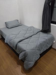 Postel nebo postele na pokoji v ubytování Oasis Condominiums Ipoh + 4 fotografie