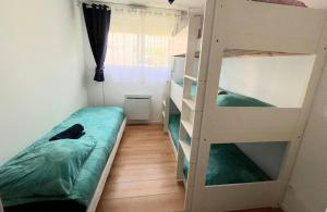 Postel nebo postele na pokoji v ubytování Apt Disneyland 2 chambres, parking, bus sur place