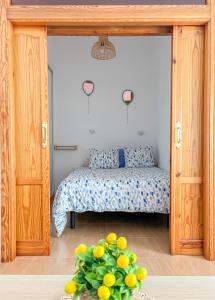 Posteľ alebo postele v izbe v ubytovaní Plz de la Merced Apartamentos Solera