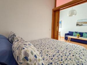 Posteľ alebo postele v izbe v ubytovaní Plz de la Merced Apartamentos Solera