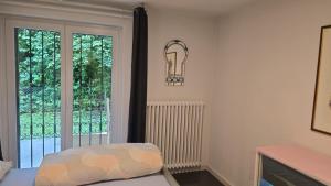 Rúm í herbergi á Eco Home