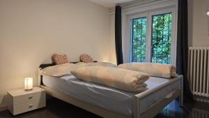 Rúm í herbergi á Eco Home