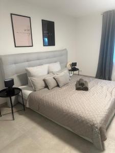Postel nebo postele na pokoji v ubytování Luxury Apartments Marz