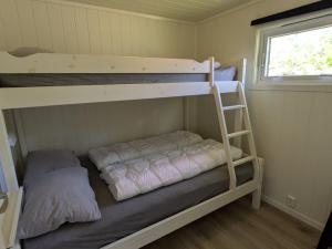 Postel nebo postele na pokoji v ubytování Oldevatn Camping