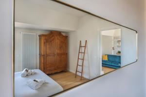 Posteľ alebo postele v izbe v ubytovaní Penthouse with big terrace in Oltrarno