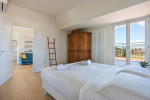 Posteľ alebo postele v izbe v ubytovaní Penthouse with big terrace in Oltrarno